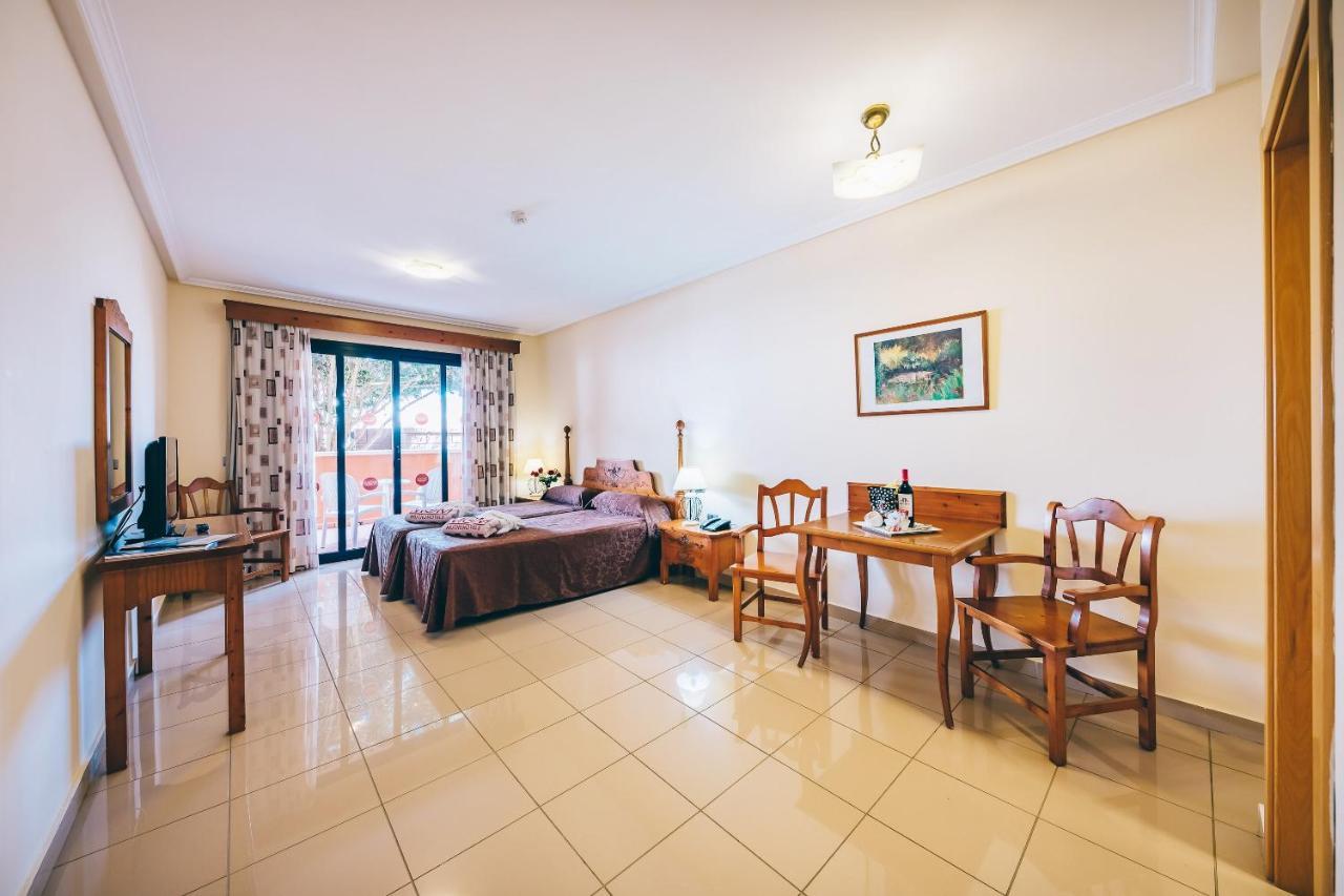 Grand Muthu Golf Plaza Hotel San Miguel de Abona Exterior foto A typical hotel room