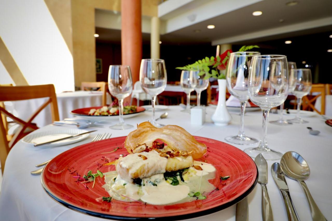 Grand Muthu Golf Plaza Hotel San Miguel de Abona Exterior foto A restaurant in the resort